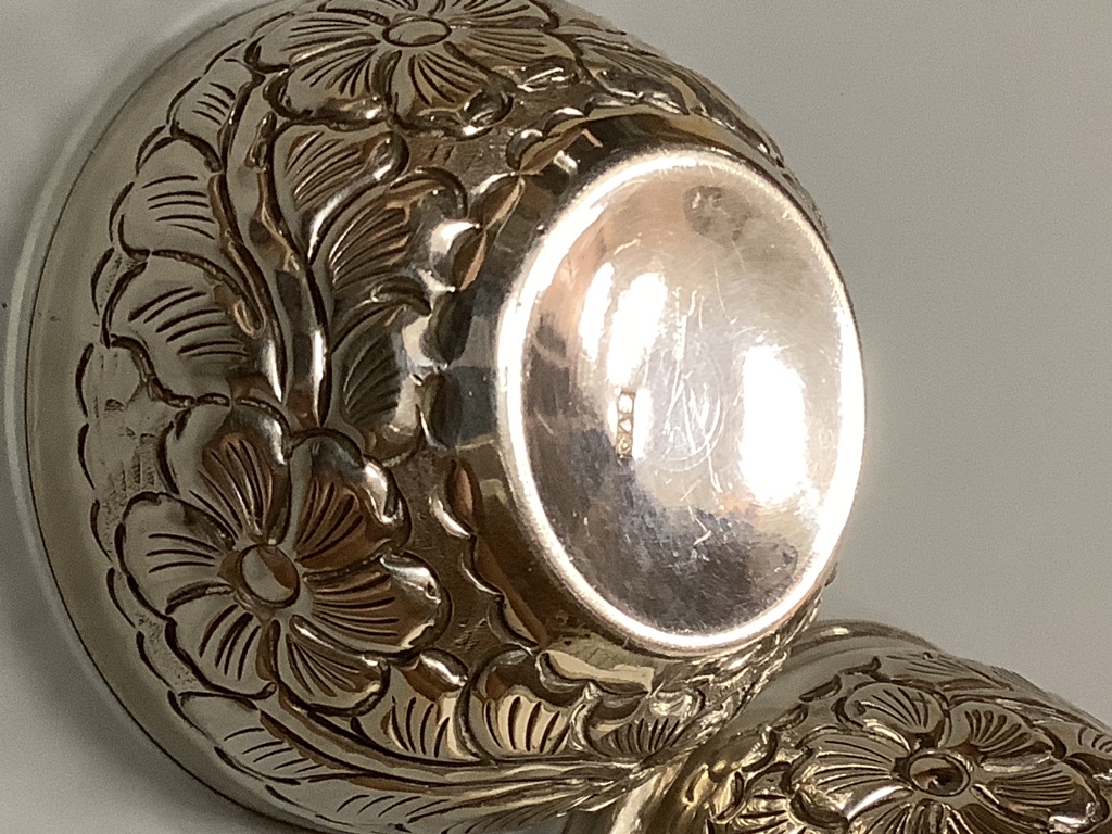 A 20th century Egyptian white metal embossed box and cover, modelled as an egg, post 1946 mark, height 10.7cm, 139 grams.